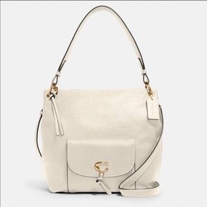 Brand new in packaging!  Coach purse.